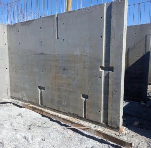 Large panel and sky deck system used in housing projects for efficient concrete pouring.